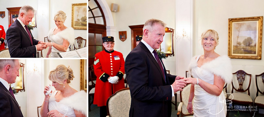 The bride and groom exchange vows and rings during their Christmas-time elopement from their home in Wales. 