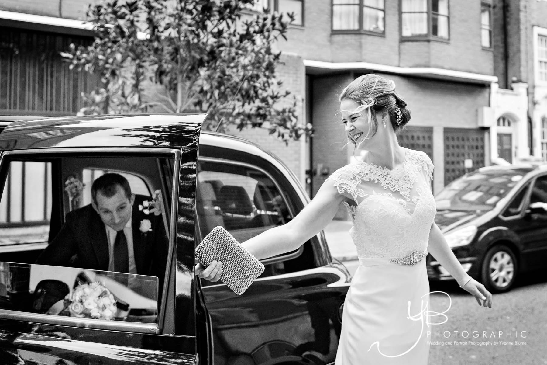 Gorgeous shot of bride arriving at Chelsea Register Office