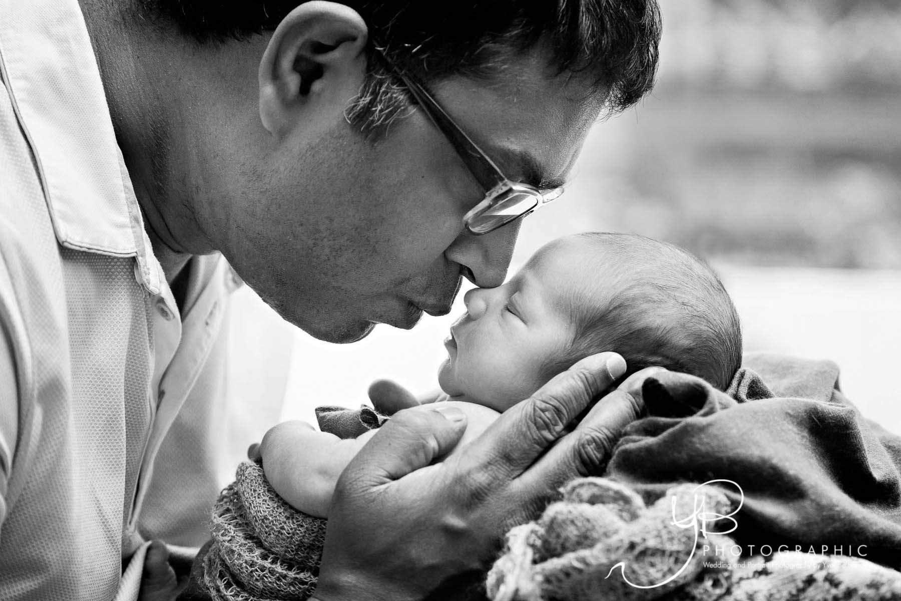 Father snuggles his newborn baby son | YBPHOTOGRAPHIC