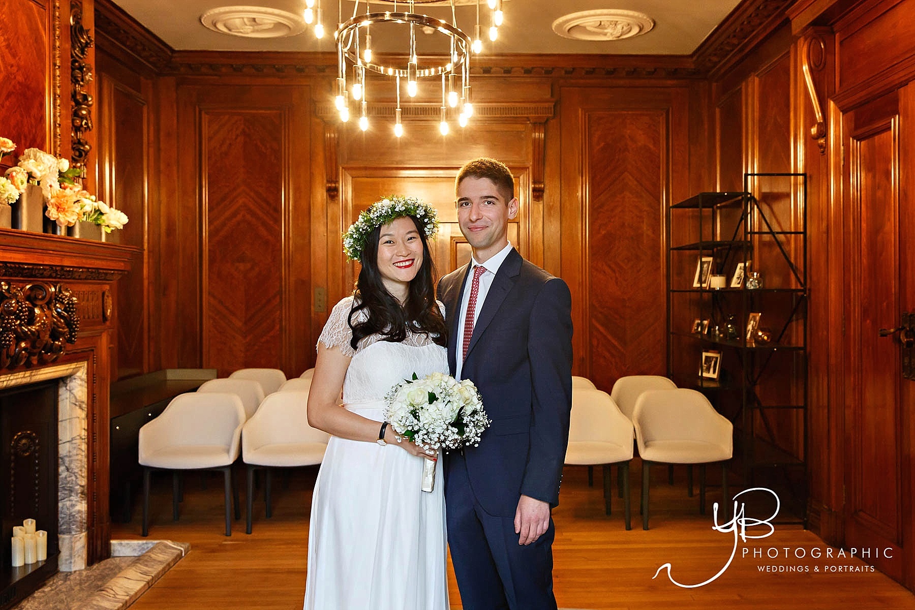 A wedding portrait of the bride and groom in Westminster's Soho Room. 
