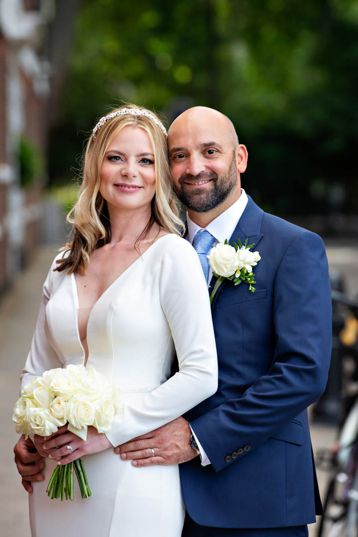 A classic portrait of a bride and groom on Kings Road after their Brydon Room wedding.