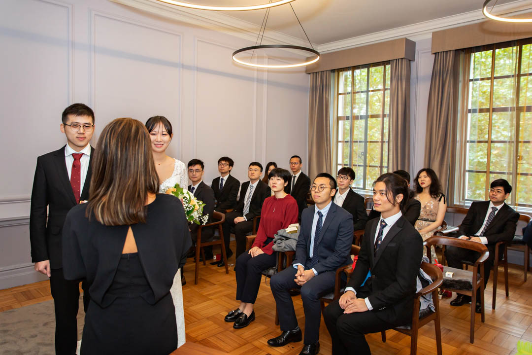 The guests look on with great concentration as the wedding ceremony begins in the Knightsbridge room.